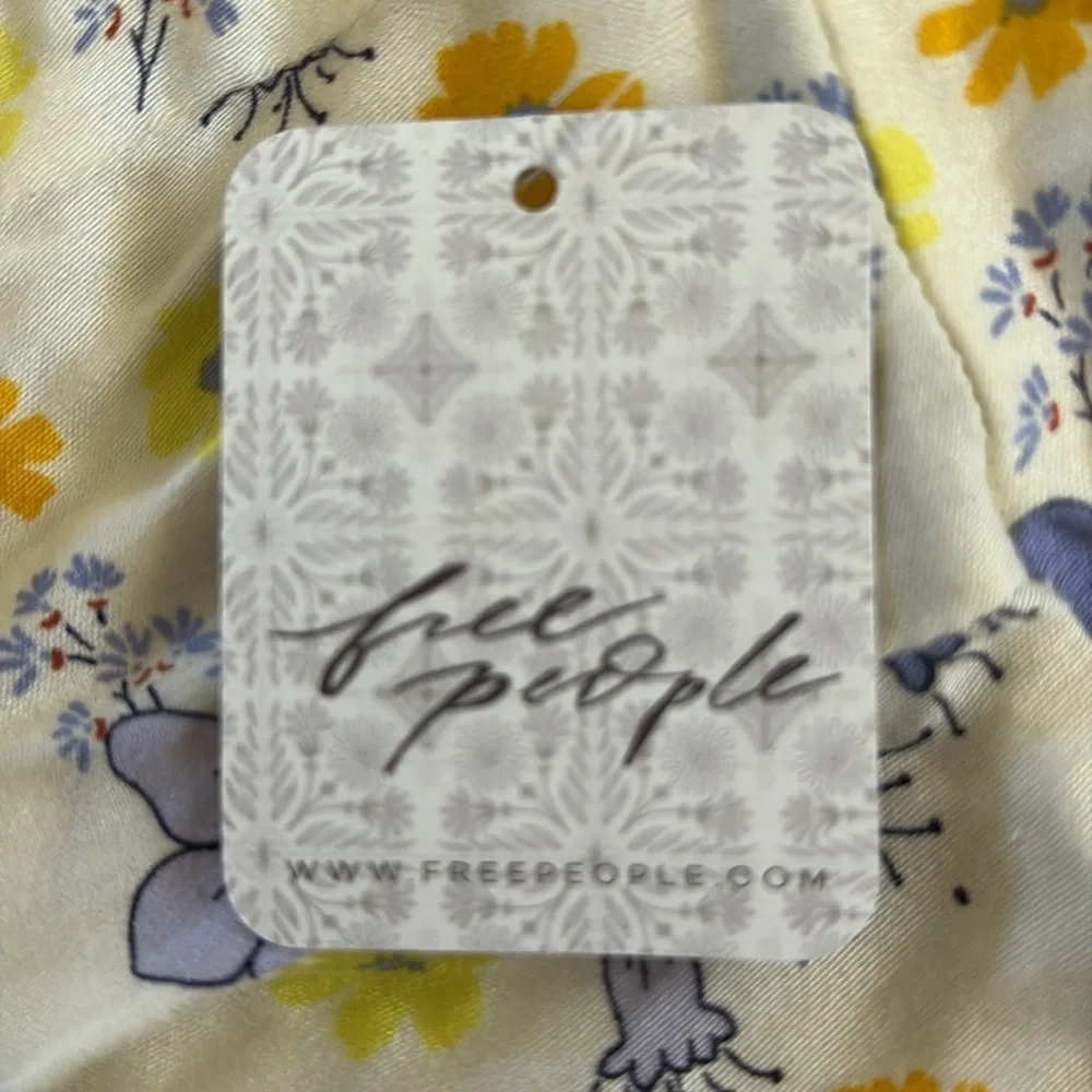 NWT FREE PEOPLE “It Takes Two” wrap mini dress in ivory combo